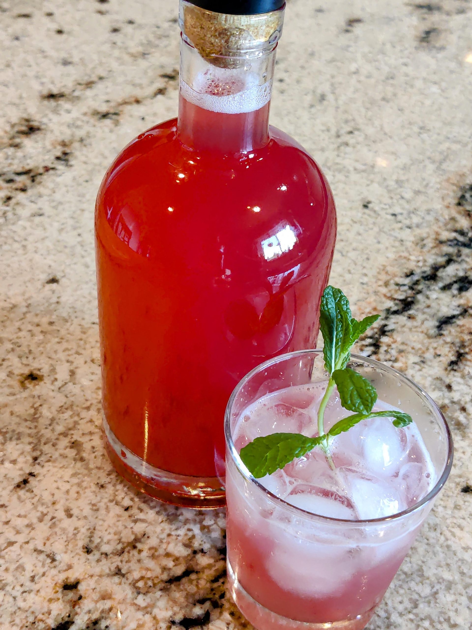 Rhubarb syrup in a bottle