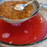 Straining the rhubarb pulp