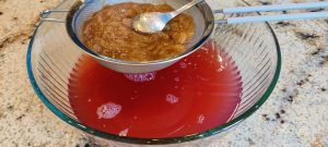 Straining the rhubarb pulp