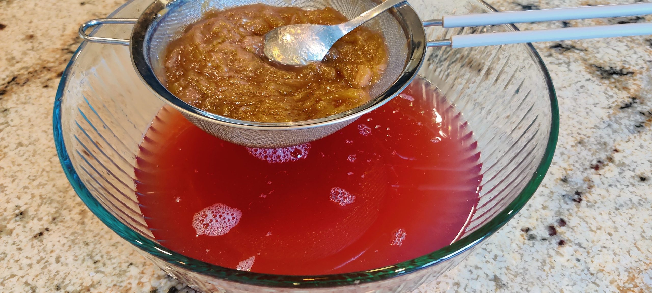 Straining the rhubarb pulp