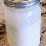 Salt and straw ice cream base chilling in a glass jar.