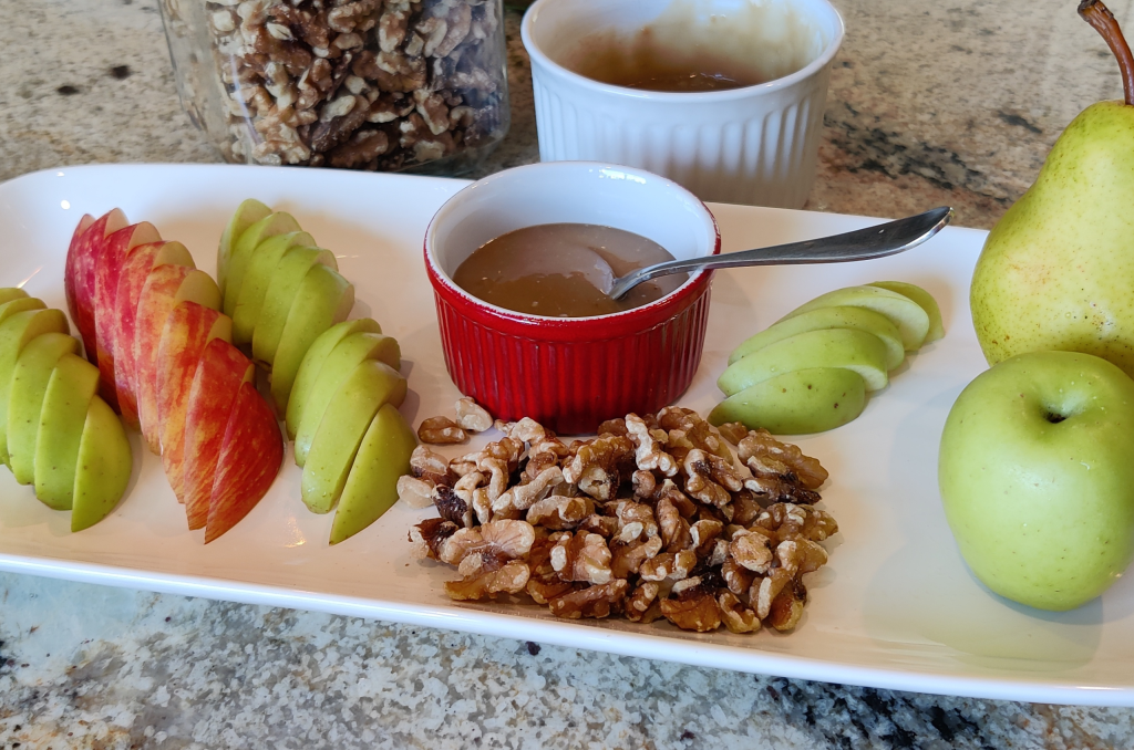 plant based caramel with apples on white serving platter