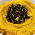 Turmeric mashed potatoes with charred scallion butter