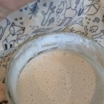 Sourdough starter, bubbling in a glass jar